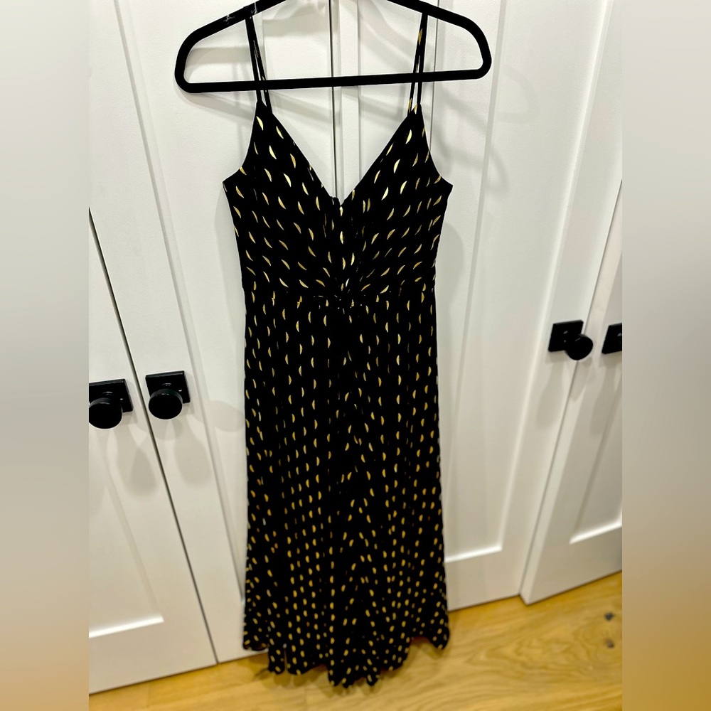 Long black dress with playful gold details! Perfect for the holidays!